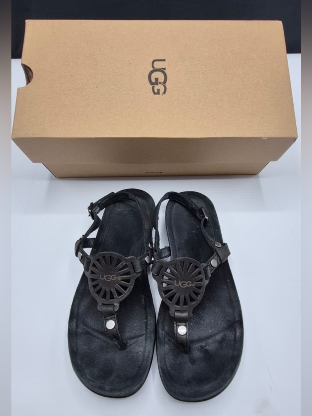 UGG Women's Black Leather T-strap Sandals with Logo Medallion